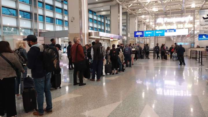 Free food boxes help federal workers at MSP Airport weather the shutdown
