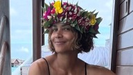 Halle Berry exposes her bare chest in see-through dress in stunning waterside photos