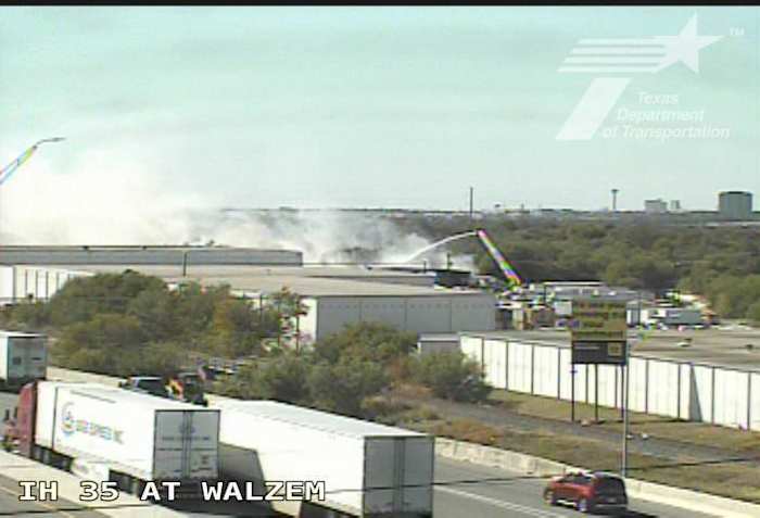 Multiple 18-wheelers catch on fire at business on Northeast Side, SAFD says