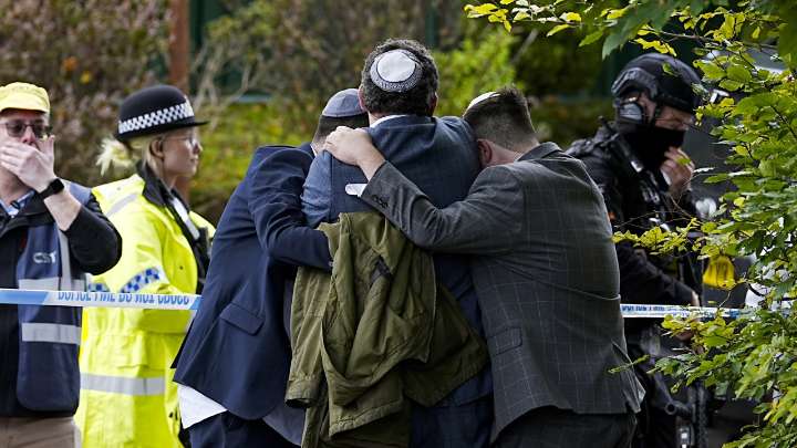 Manchester synagogue suspect named by counter-terrorism police as two men, woman arrested after deadly attack