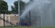 Maryland firefighters charged after flooding baseball field