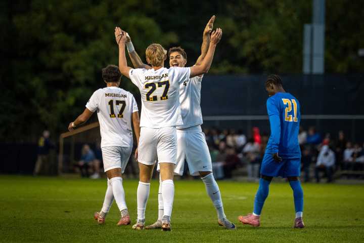 Michigan puts pieces together in pivotal home match, securing 3