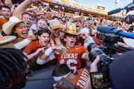 The Latest: Big shakeups in store for the college football top 10 of the AP Top 25 coming soon