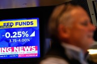 Asian shares, oil prices fall back following Trump's meeting with Chinese leader Xi