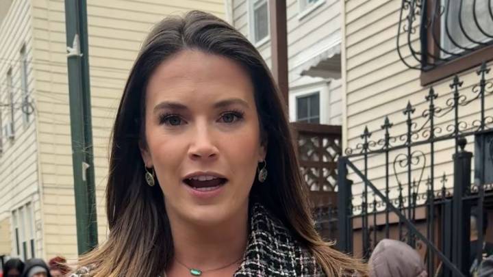 Federal workers stand in line at a NYC food bank