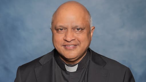 Defendant in priest death makes angry court outburst
