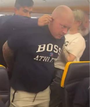 Ryanair Flight Diverted After Drunk Passenger Tries to Open Exit Mid