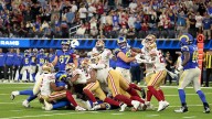 Short-handed 49ers stop Rams on downs in overtime, preserving a 26