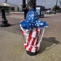 Fired Up For 250: Fire hydrants painted with patriotic theme