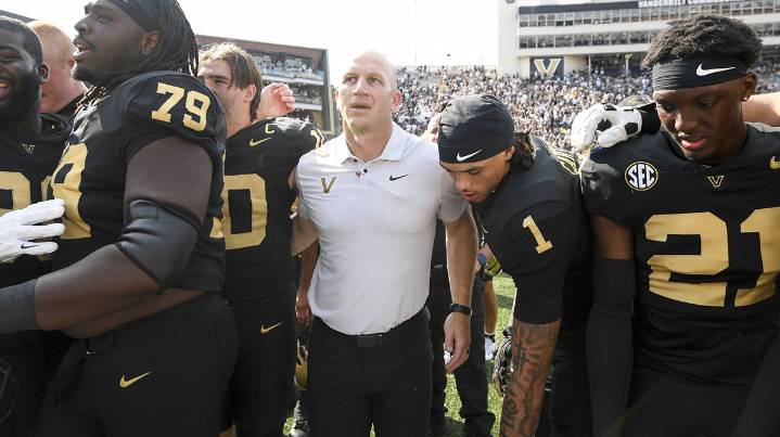 Vanderbilt coach Clark Lea reacts to Diego Pavia’s Heisman pose after beating LSU