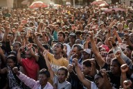 Madagascar president leaves country after soldiers turn against him