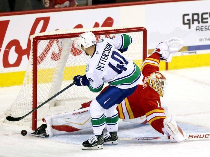 Canucks 8, Flames 1: Elias Pettersson's blast from past overshadows roster battles