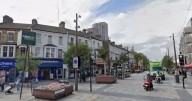 Two boys rushed to hospital after ‘acid attack’ on busy high street as three arrested