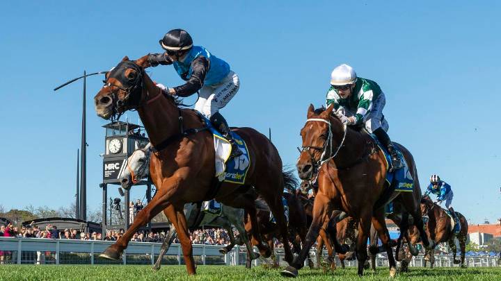 Jamie Melham becomes first female in Caulfield Cup history to claim the revered event aboard Half Yours