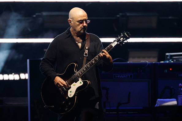 Oasis replaces guitarist Bonehead on tour after cancer diagnosis