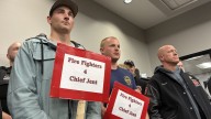 Fire chief reinstated after leave; residents, firefighters push for adding staff