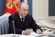 Putin directs drills of Russian nuclear forces as his summit with Trump is put on hold