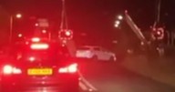 Moment Scots motorists drive through 'broken barrier' on level crossing