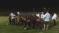 Globe unites over high school football amid flood recovery