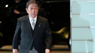 Japan says it plans to tell Trump it will build up military and upgrade security strategy