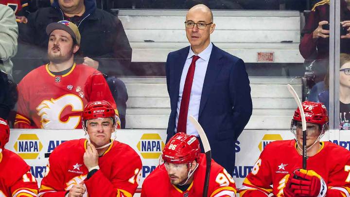 Flames lock up head coach for 2 more years