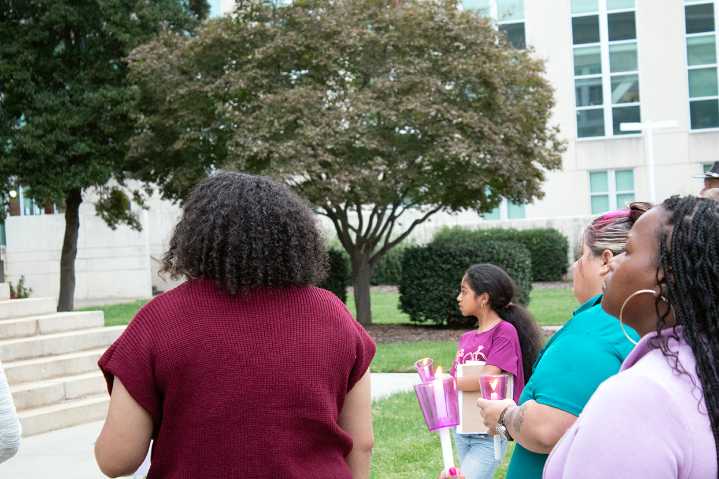 Candlelight vigil honors domestic violence victims and survivors