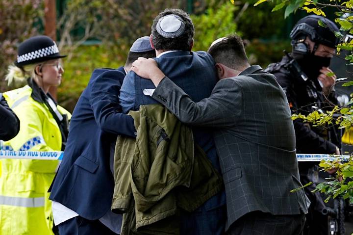 Man kills 2 and wounds 4 in car ramming and stabbing at English synagogue on Jewish holy day