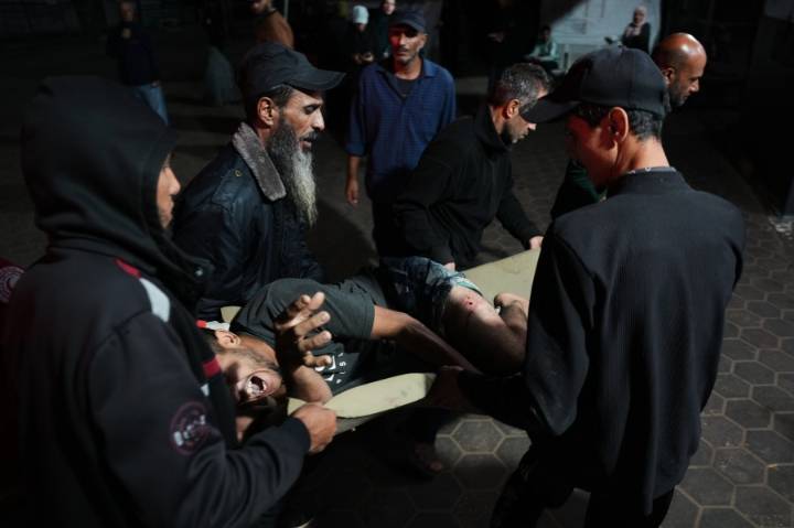 Israel's military says ceasefire is back on as death toll from overnight strikes in Gaza reaches 104