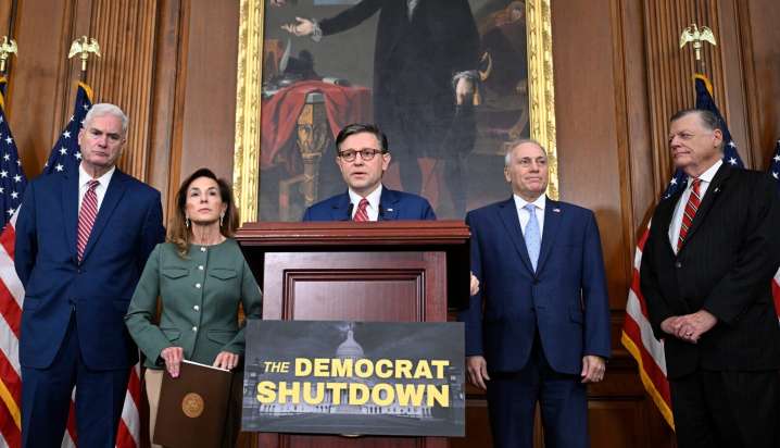 Federal government shutdown grinds into a second week, but quiet talks emerging