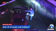 Orange County chase ends after authorities surround driver, passenger in suspected stolen car