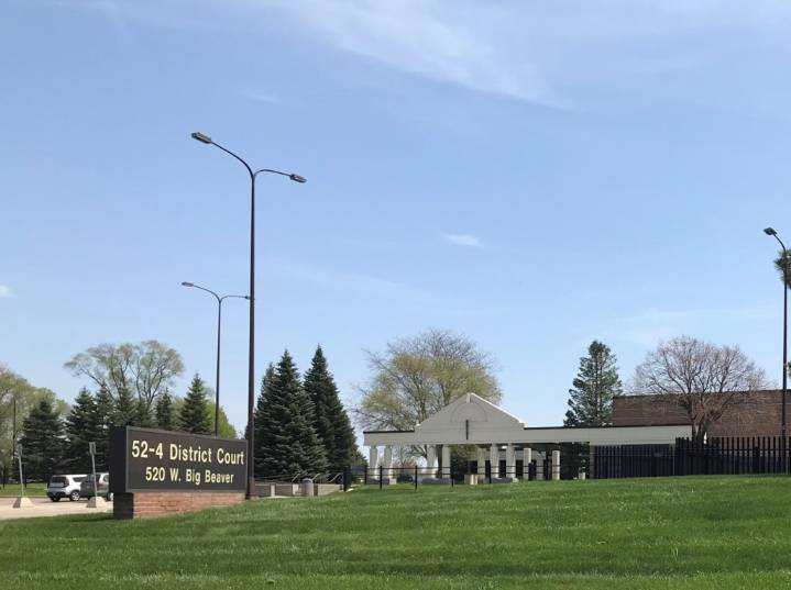 Detroiter accused of embezzling $80K while working as bank teller in Troy