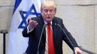 Trump heckled as he tells Israeli parliament peace deal marks 'historic dawn of a new Middle East'