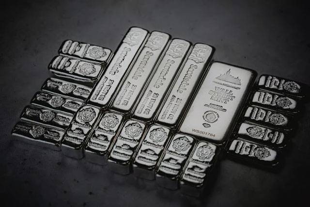 Silver nears record high amid market squeeze, gold hits all