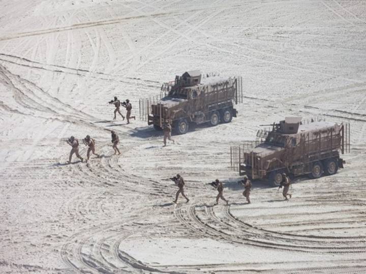 Kim Jong Un Unveils Powerful Weapons at Military Parade
