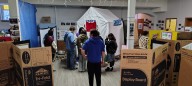 Students walk through the struggles of refugees at YWCA’s Camp Hope exhibit