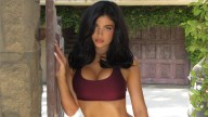 Kylie Jenner shows off new shoulder-length haircut in burgundy workout set
