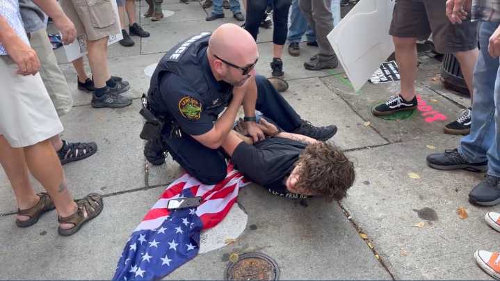Man arrested on gun charges after altercation with 'No Kings' protester in Kent, police say