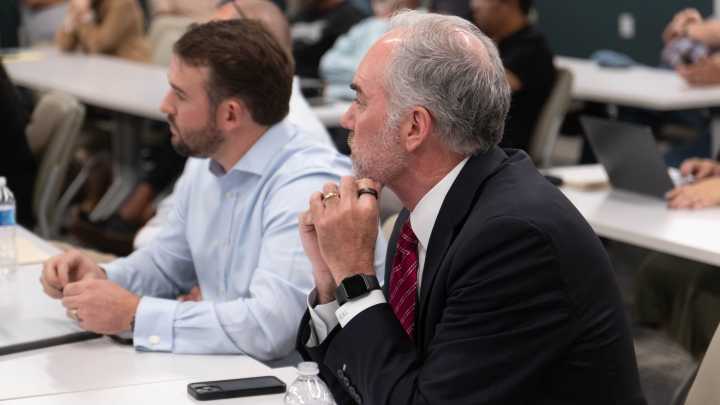 Downtown hotel rebate transfer draws crowd, sparks opposition