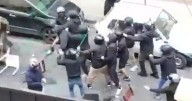 Champions League thugs brawl in huge street fight as fan hospitalised and arrests made