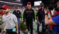 Mizzou head coach Eli Drinkwitz asks Alabama's Kalen DeBoer about his 'black hoodie of death'