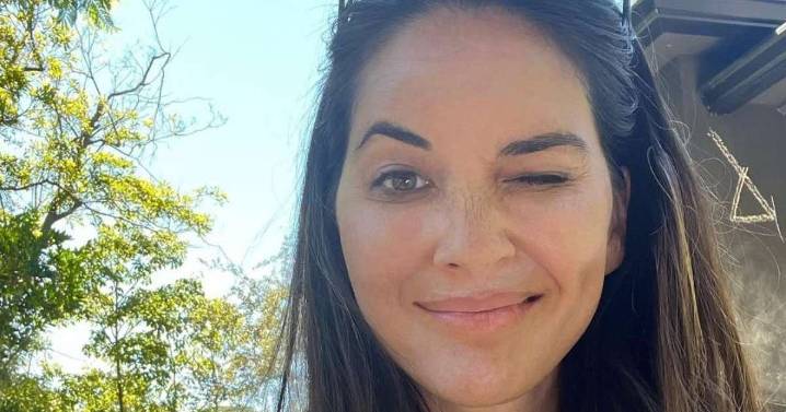 Olivia Munn Wows Fans in Bold Neckline Dress