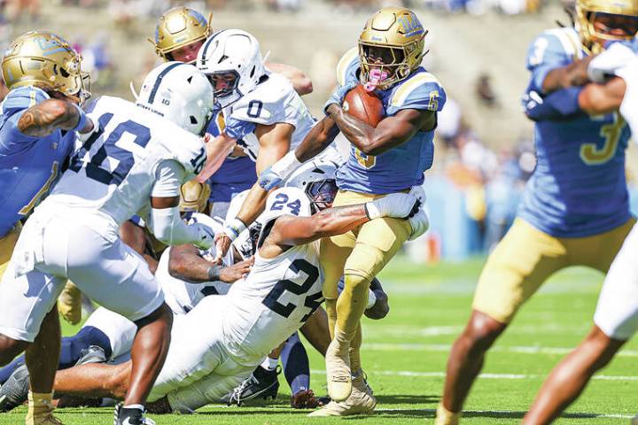 Top 25 roundup: UCLA earns 1st win, stuns No. 7 Penn State