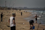 Hamas reaffirms commitment to ceasefire as delays in returning hostages' bodies fray nerves