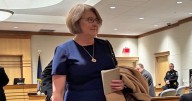 New Hampshire judge accused of trying to meddle in probe of her husband returns to the bench