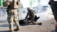 Feds make arrests, deploy tear gas during faceoff with protesters near Little Village discount mall
