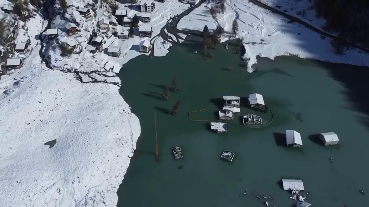 Hotelier rebuilds after devastating landslide all but swallowed up Swiss village