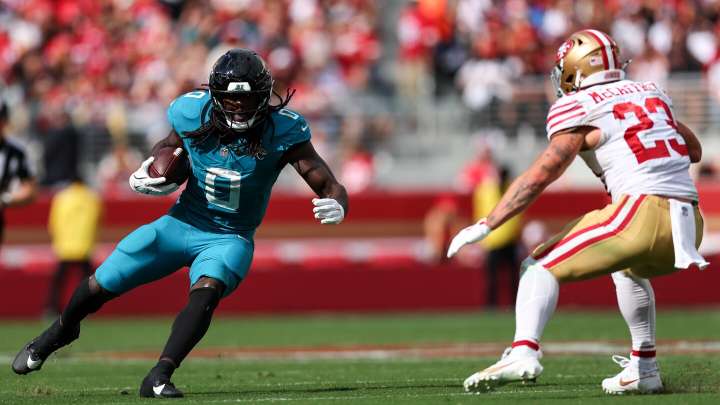 NFL fines Christian McCaffrey $23,186 for lowering his helmet into Jaguars' Devin Lloyd