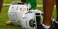 High school football action continues on rain-threatened Friday night across Kansas City