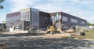 Madison Common Council questions planners regarding men's homeless shelter on Bartillon Drive