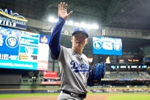 Yamamoto pitches Dodgers to MLB playoff win over Brewers